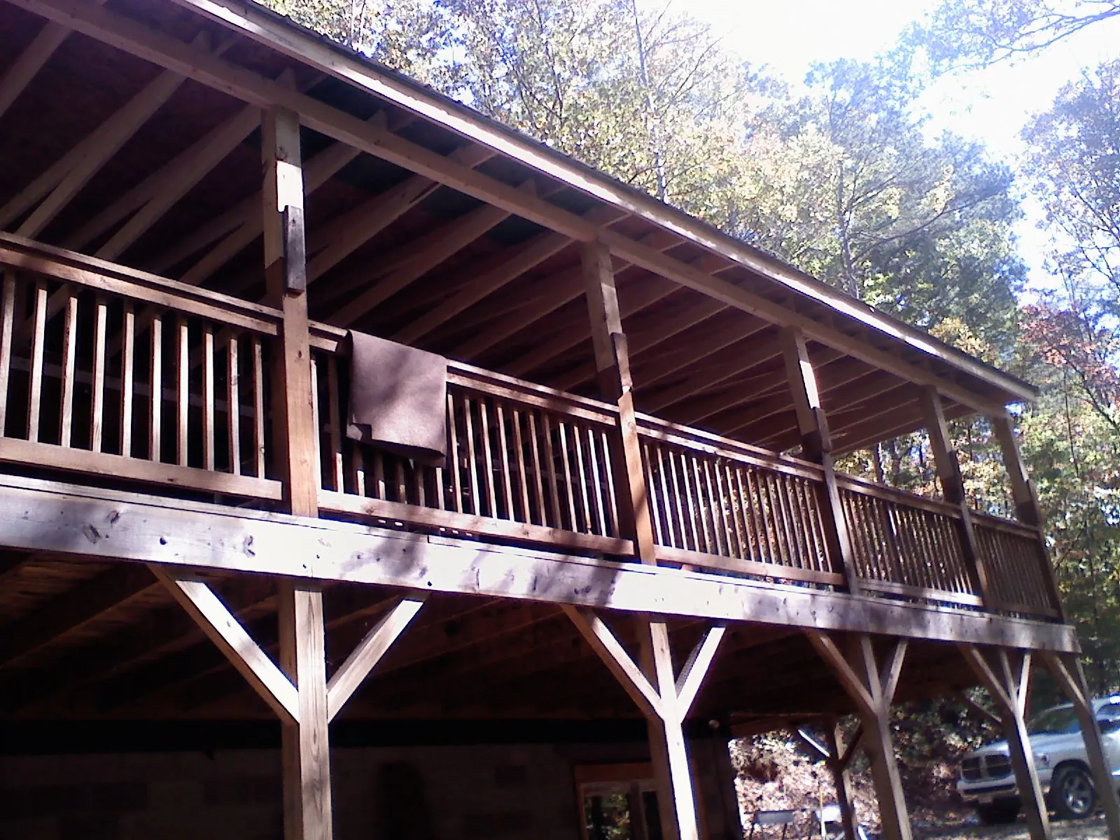 Timber framing under a new elevated porch and deck — Roof Leak Repair in Lubbock by Roofing Brothers